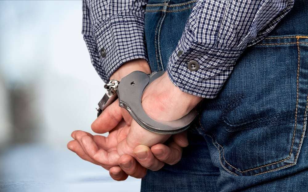 Man With His Hands Handcuffed Behind His Back